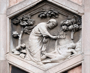 Fototapeta premium Creation of Adam, Andrea Pisano, 1334-36., Relief on Giotto Campanile of Cattedrale di Santa Maria del Fiore (Cathedral of Saint Mary of the Flower), Florence, Italy