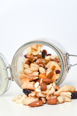 Healthy snack food trail mix of mixed nuts and dried fruits