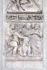 Fototapeta na wymiar BOLOGNA, ITALY - JUNE 04: The brothers show Joseph's clothes to Jacob, panel by Girolamo da Trevisio on the right door of San Petronio Basilica in Bologna, Italy, on June 04, 2015
