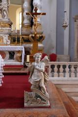 Angel on the altar in Franciscan church of the Friars Minor in Dubrovnik, Croatia 