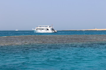 Fototapeta na wymiar white yacht in incredibly beautiful azure sea