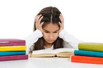 Cute Little Girl Having a Hard Time with Her Homework. Isolated On White Background