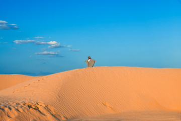 Fototapeta na wymiar the sands of the Sahara desert lit by the setting sun