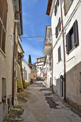 Obraz premium A road between the houses of an Italian mountain village