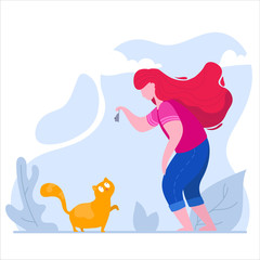 Girl plays with a cat in a park on nature. © elenapozdnyakova