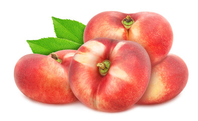 Composition with whole freshly picked flat nectarines with leaves isolated on white background. As design element.