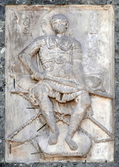 Relief depicting Saint Theodore, facade detail of St. Mark's Basilica, St. Mark's Square, Venice, Italy