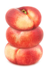 Heap of whole flat nectarines isolated on white background. As design element.