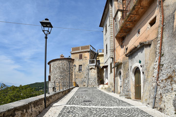 Fototapeta na wymiar A road between the houses of an Italian mountain village