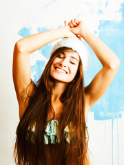 young pretty woman smiling happy in red santa hat at new year, lifestyle holiday people concept