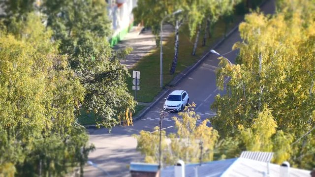 City with houses and cars, top view, timelapse.