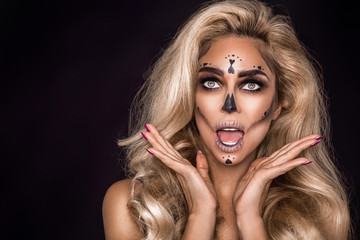 Sexy witch with Halloween skeleton make up - Image