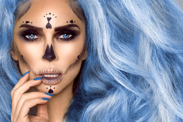 Halloween Sexy Witch portrait. Beautiful young woman in witches makeup with long curly colorful hair and bright lips. Wide Halloween party art design - Image