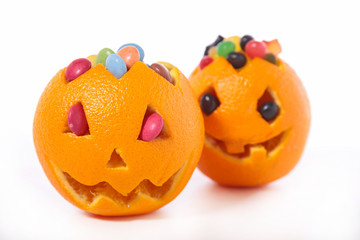 orange jack o lantern with candies- halloween festive