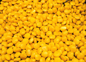 Cooked yellow lupinus albus beans at the market. Food to go. Tasty take away snack suitable for vegeterians and vegans