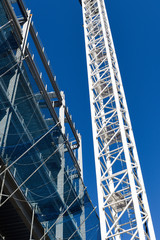 Construction Crane in operation working on Steel framed building.