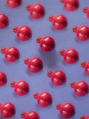 Pomegranate pattern on purple background