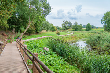 Walking path along the river. Natural Park. Beautiful landscape.