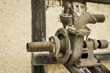 Old rusty machinery with pipes