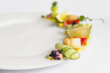 Fried scallop  on a white plate