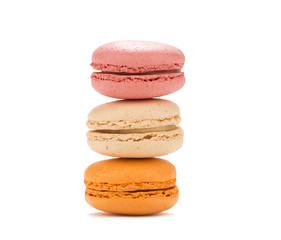 Heap of colorful macaroons isolated on white background.    