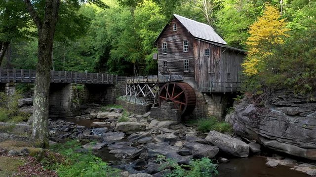Low aerial view of the bridge and Grist Mill in Babcock State Park in West Virginia.