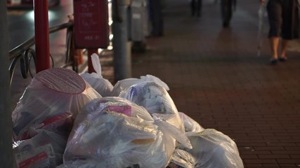 City trash urban on street side walk