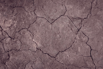 Texture of land dried up by drought vintage tone