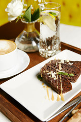 Chocolate brownie and coffee breakfast