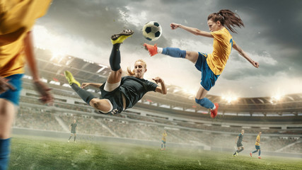 Fototapeta na wymiar Excitement. Young female soccer or football players in sportwear kicking ball for the goal in action at the stadium. Concept of healthy lifestyle, sport, motion, movement. Collage made of 2 models.