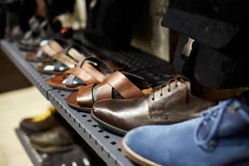Men's shoes on a shelf in a store