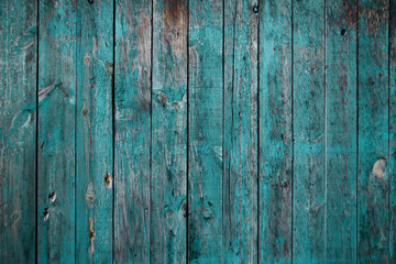 Old teal colored wooden wall