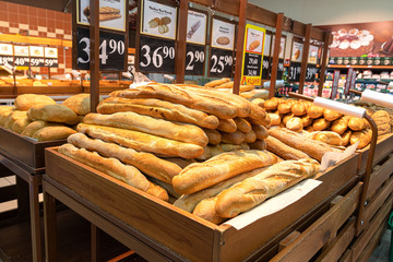 freshly baked baguettes on the counter in the bakery shop