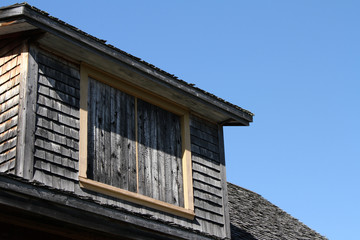 old abandoned wooden house window