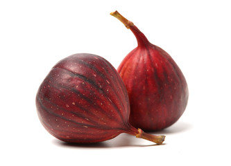 Ripe figs on a white background