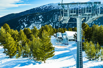 Chairlift for skiers on a rope