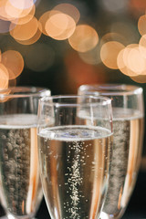 three glasses of champagne for Christmas celebration © Mannaïg