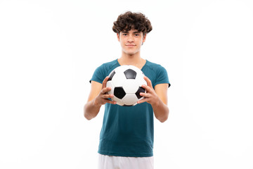 Young football player man over isolated white wall