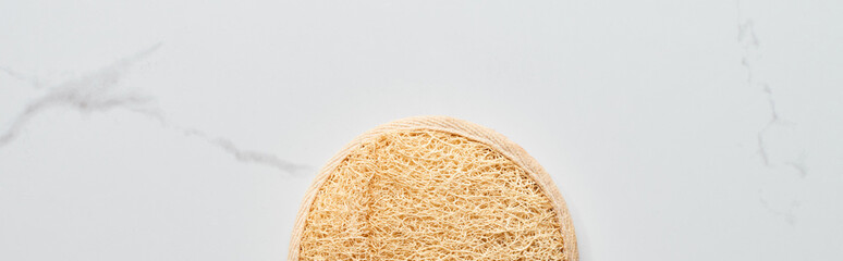 panoramic shot of facial sponge on marble surface
