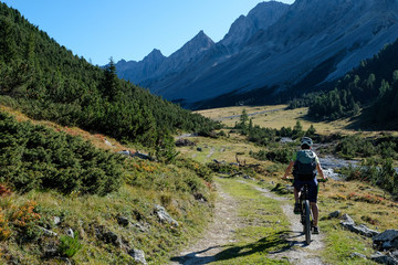 Fototapeta premium Mountain Biking around the high Valleys of Davos, Graubuenden, Switzerland, Europe