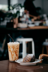 cup of coffee on wooden table