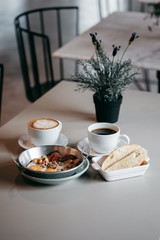 cup of coffee on wooden table