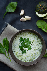 healthy green vegetarian cream soup. top view