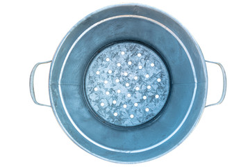 Large metal boiler with holes at the bottom and handles on the sides , top view, isolated on a white background with a clipping path.