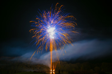 Fireworks over a lake for a wedding