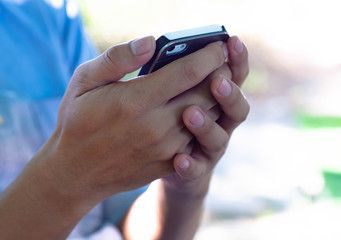 Man hand holding smartphone