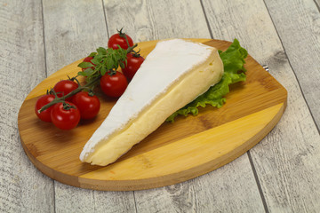 Brie cheese triangle served salad