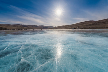 Landscape view of the Baikal lake in winter with sunny blue sky, Russia