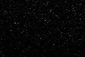 Chaotic white bokeh on a black background, light spots texture, abstraction, falling snow, starry sky, bright glare of light texture