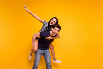 Photo of crazy cheerful nice cool couple wearing jeans denim toothily smiling laughing while...